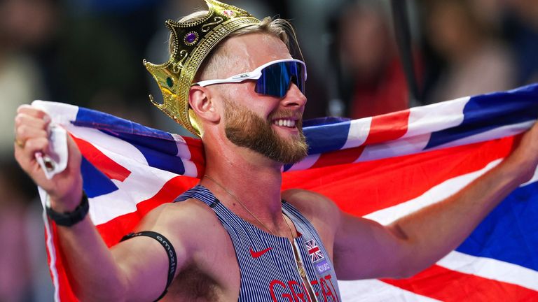 Josh Kerr celebrates his gold for Great Britain in the men's 3,000m at the World Athletics Indoor Championships