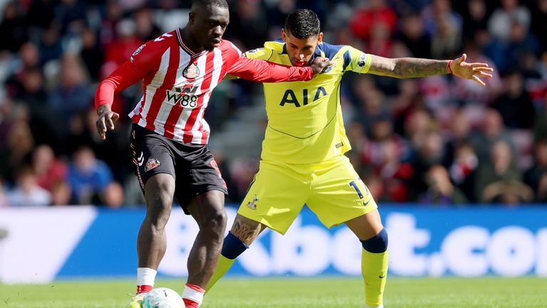 Brian Brobbey holds off Cristian Romero in Sunderland's win over Tottenham
