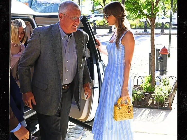 Taylor and her dad and friend Ashley out in NYC today backgrid 2