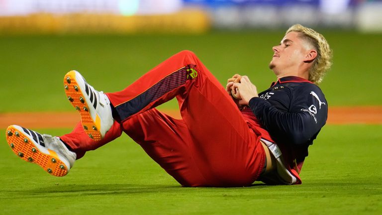 Royal Challengers Bengaluru's Jacob Bethell takes the catch to dismiss Chennai Super Kings' Jamie Overton (AP Photo/Aijaz Rahi)