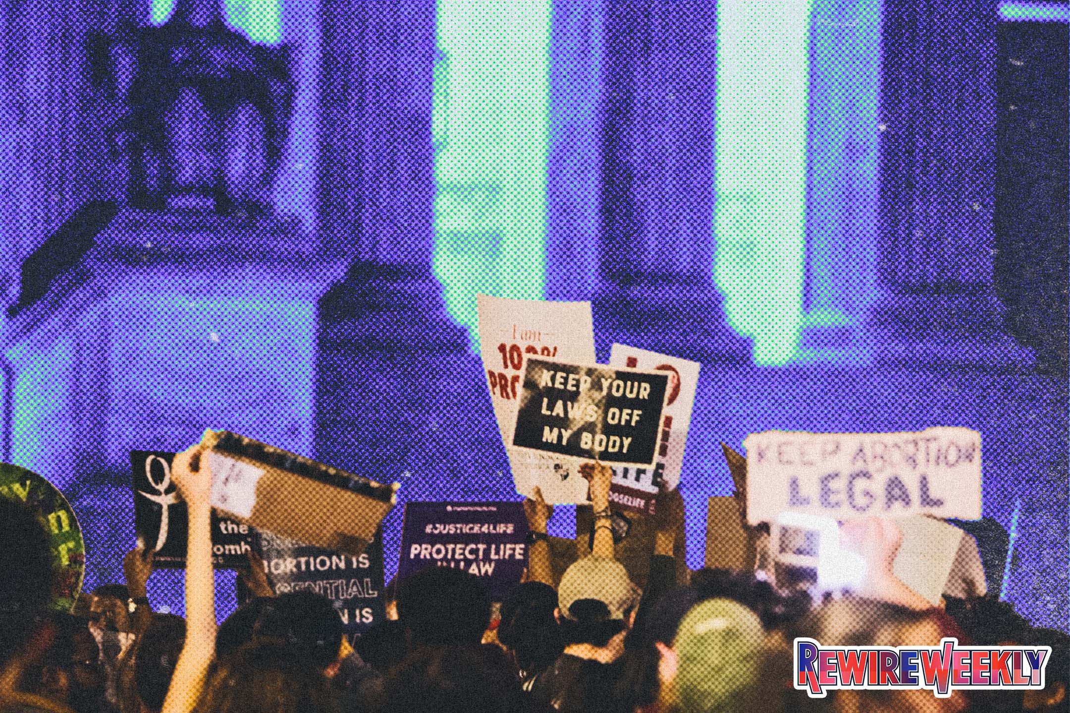 Photograph of protesters outside of the U.S. Supreme Court. One sign reads "Abortion is a personal, not a legal debate."