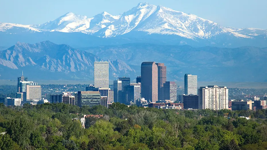 Denver, Colorado, with a mountain in the background.