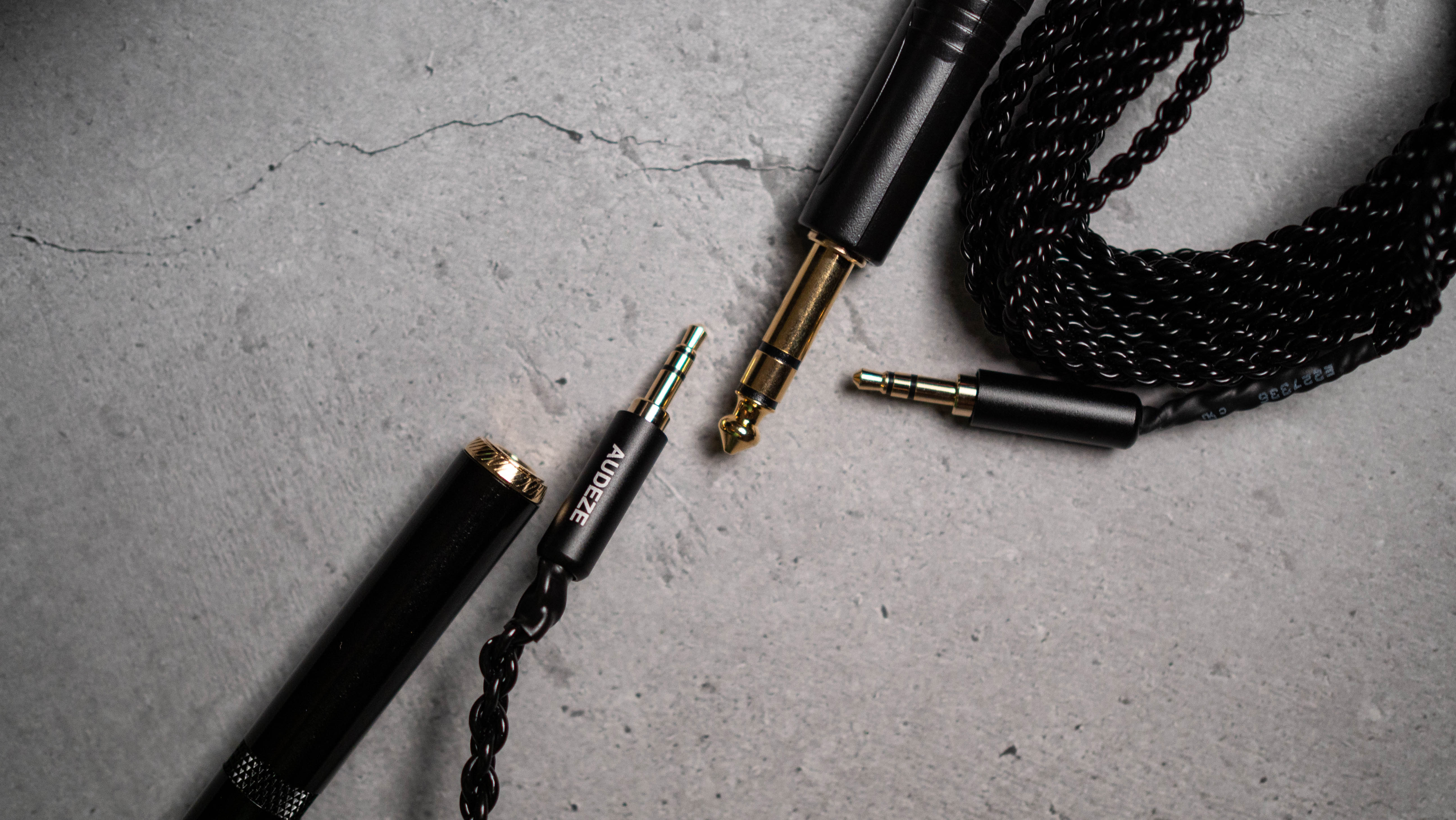 Audeze LCD-S20 planar headset against a grey craft sheet highlighting the product design