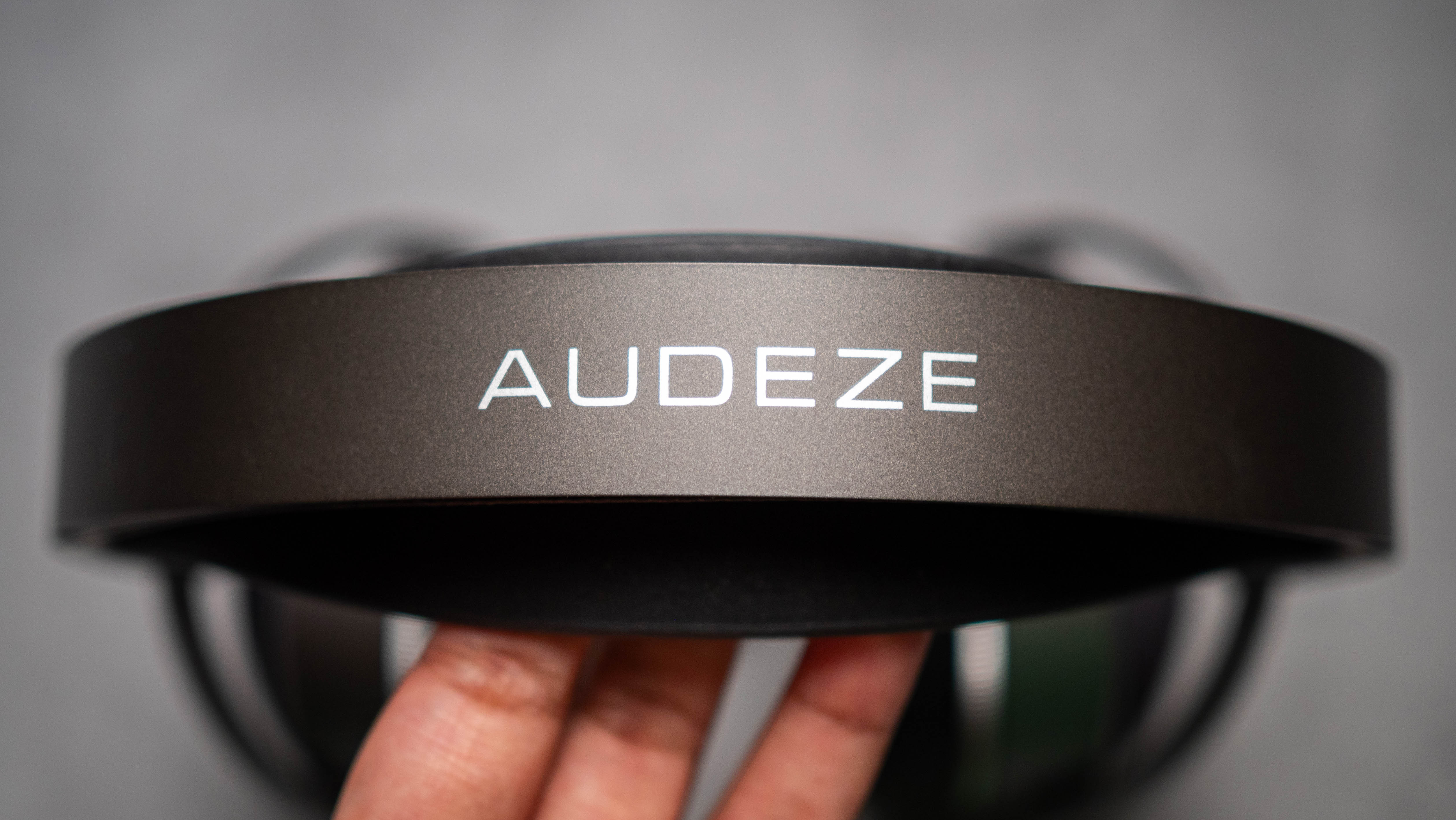 Audeze LCD-S20 planar headset against a grey craft sheet highlighting the product design
