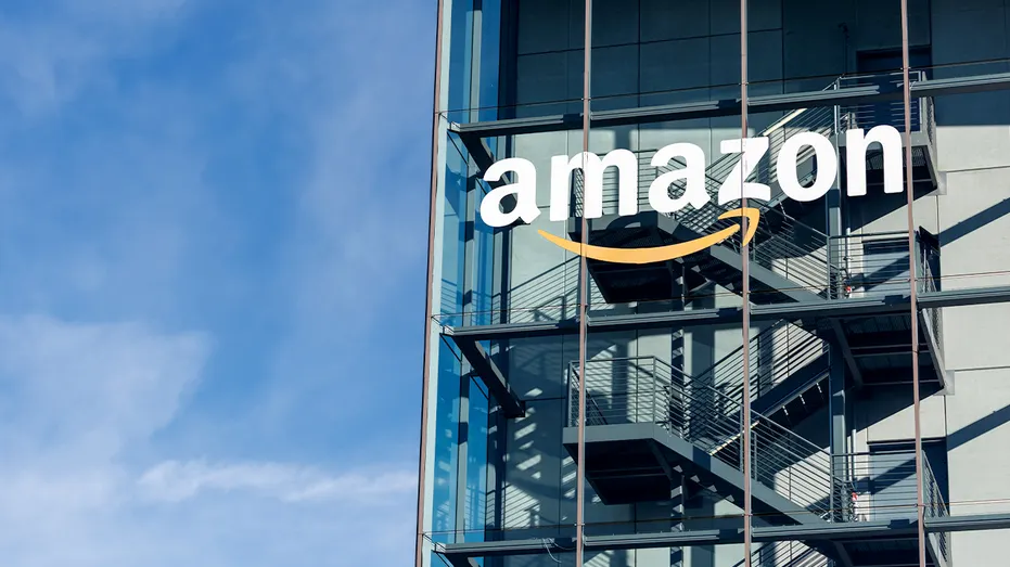 Exterior view showing the Amazon logo mounted on the building housing the company’s German headquarters in Munich.