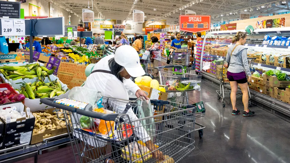 Shoppers inside a Lidl grocery store.