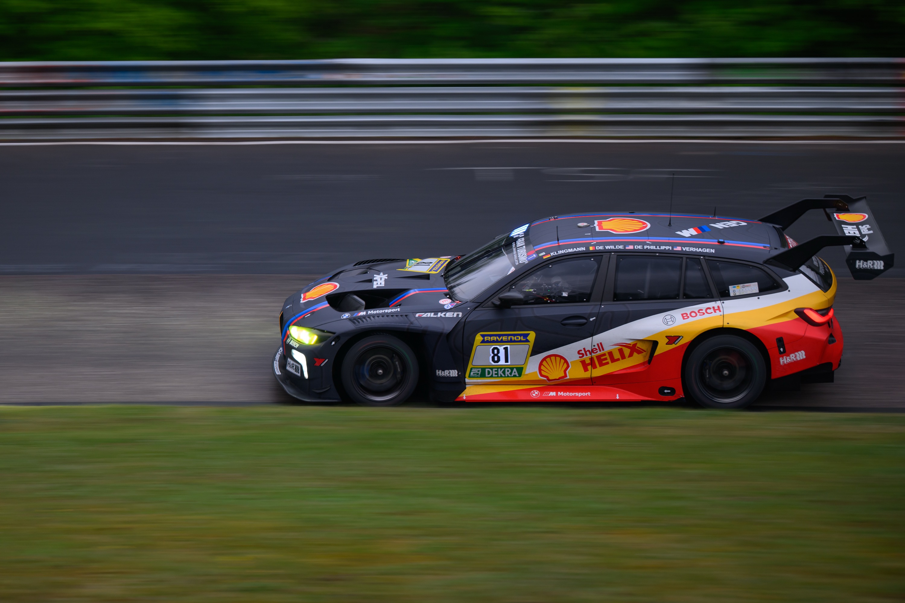 NUERBURG, GERMANY - MAY 14: The #81 BMW M3 Touring 24h with Jens Klingmann (GER), Ugo de Wilde (BEL), Connor de Philippi (USA) and Neil Verhagen (USA) of BMW M Motorsport participates on Qualifying 2 during the ADAC Ravenol 24h Race at Nuerburgring on May 14, 2026 in Nuerburg, Germany. (Photo by Christian Kaspar-Bartke/Getty Images)