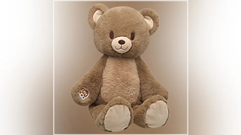 A close-up of a Build-A-Bear plush bear
