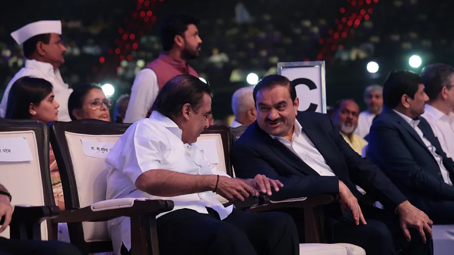 Gautam Adani having conversation during an all-party prayer meeting