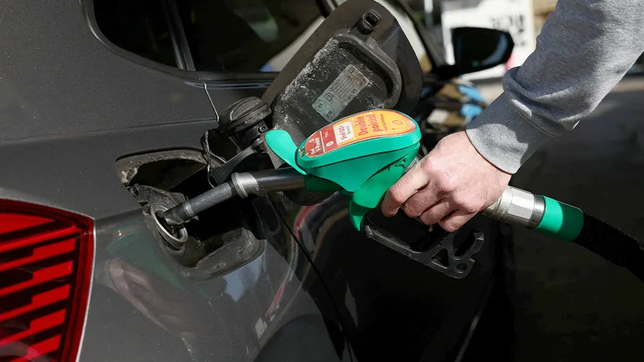 A driver refuels a vehicle at a London service station as energy costs climb amid Middle East tensions.