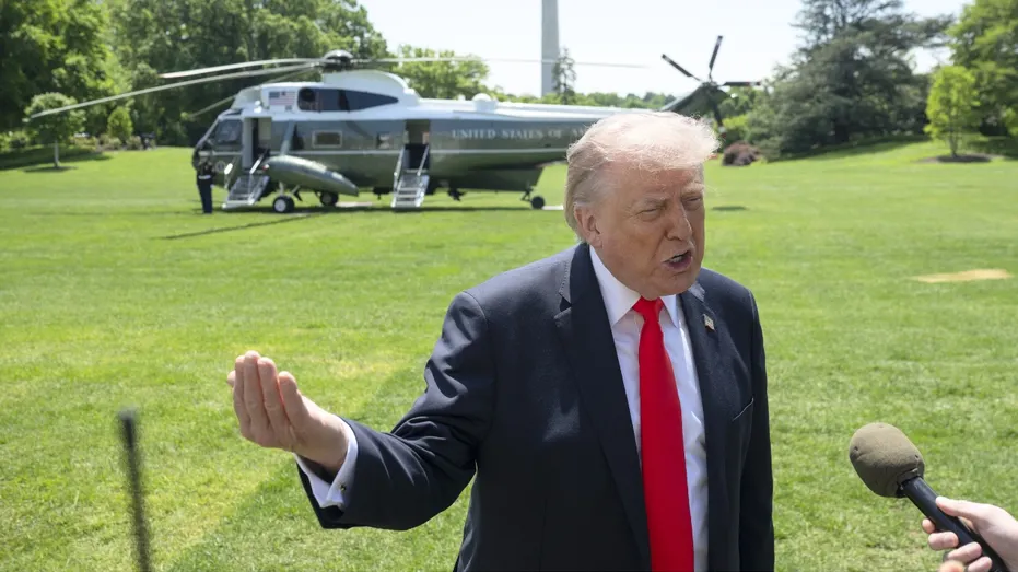 Trump speaks to reporters in front of Marine One
