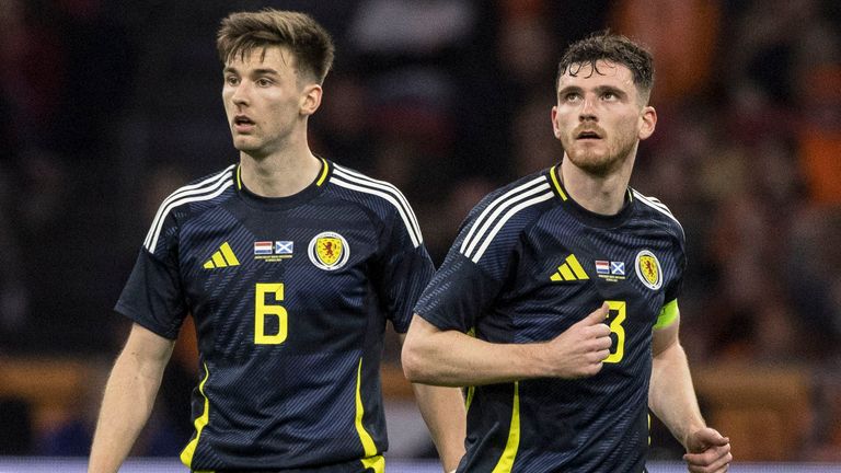 AMSTERDAM, NETHERLANDS - MARCH 22: Scotland's Andy Robertson and Kieran Tierney in action during an international friendly match between the Netherlands and Scotland at the Johan Cruyff Arena, on March 22, 2024, in Amsterdam, Netherlands. (Photo by Craig Williamson / SNS Group)