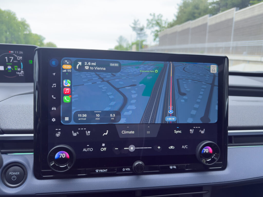 Subaru Solterra infotainment screen showing CarPlay.