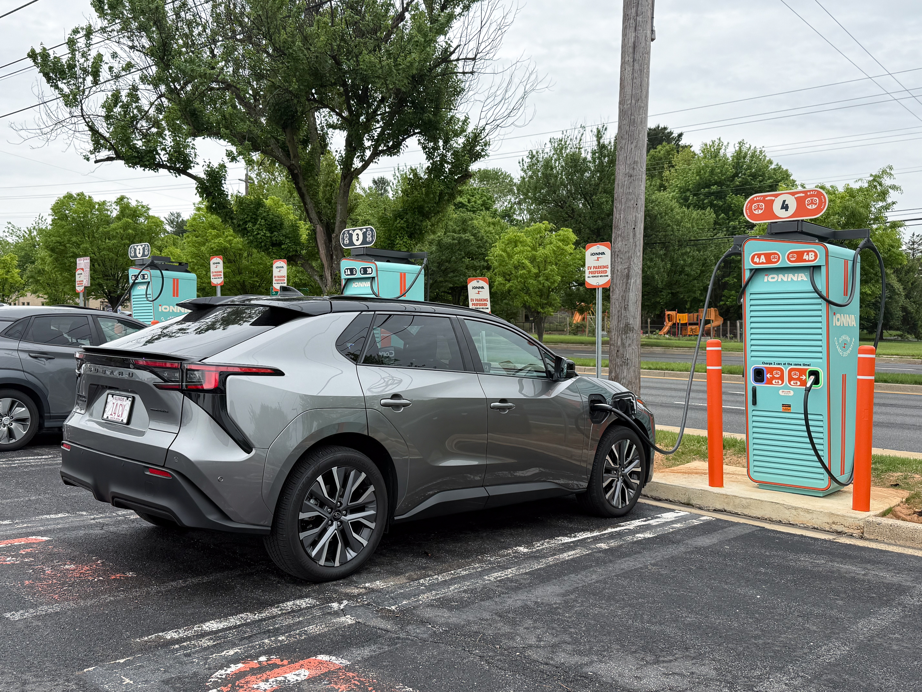 A Subaru Solterra charging at an Ionna Rechargery