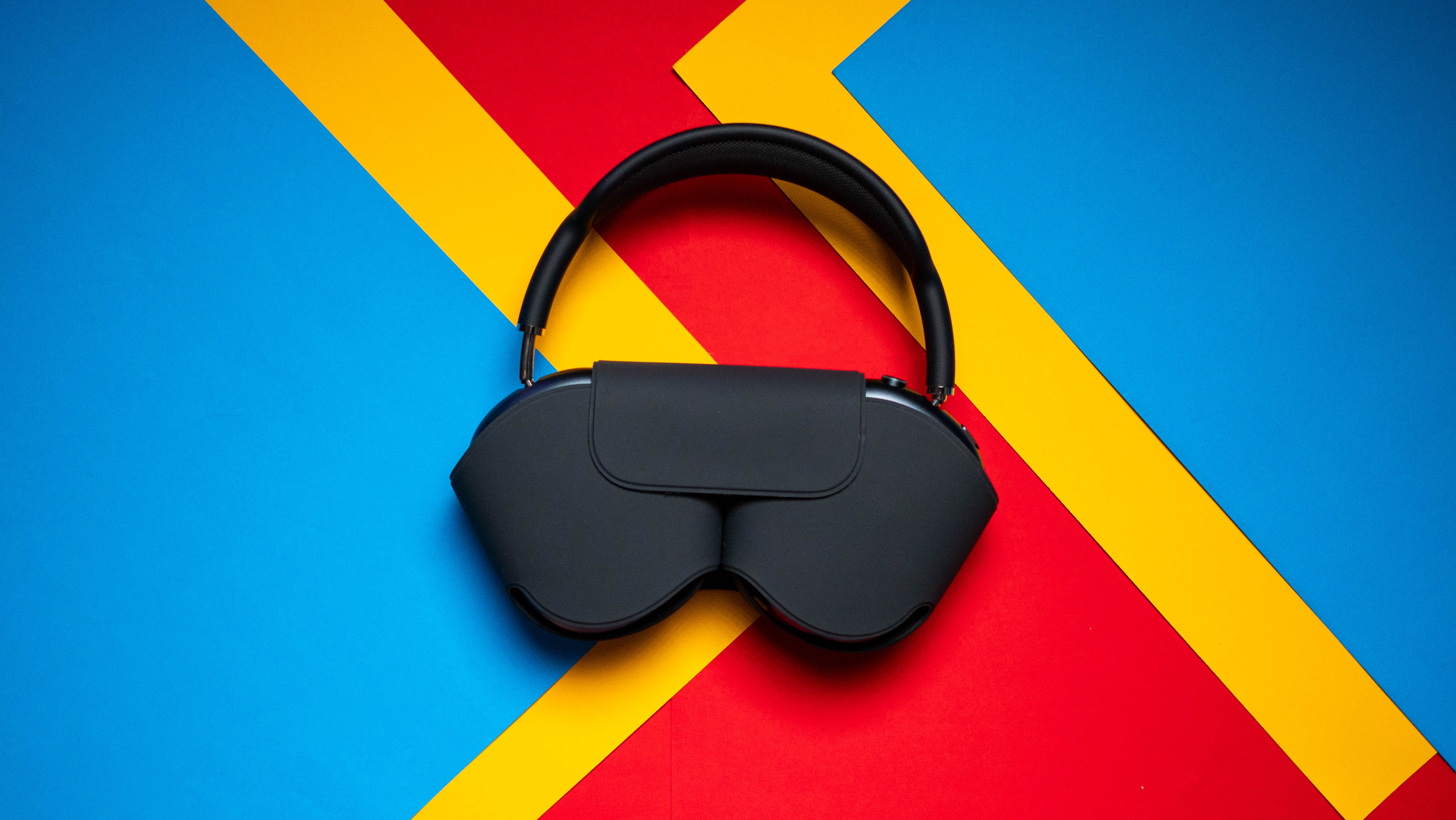 Apple AirPods Max 2 headset against a textured sheet showcasing the design
