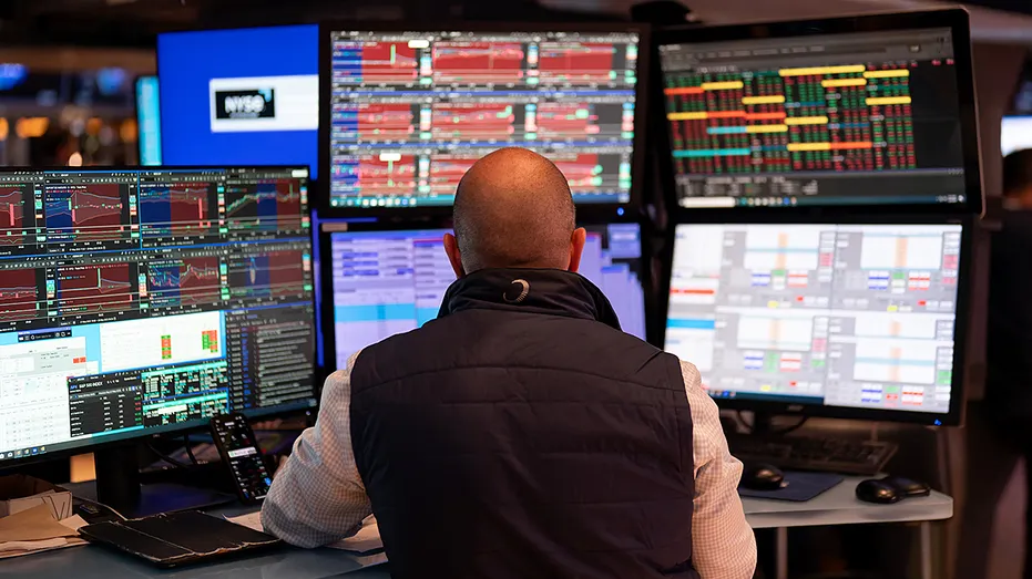 Traders on the floor of the New York Stock Exchange.
