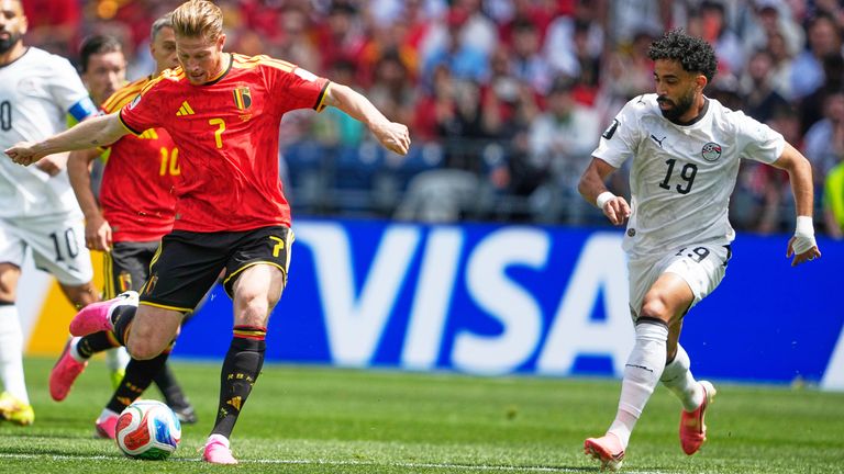 Belgium's Kevin De Bruyne, left, controls the ball chased by Egypt's Marawan Attia during the World Cup Group G soccer match in Seattle