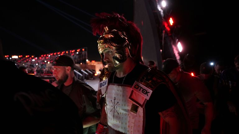 Usyk walks out to fight Rico Verhoeven in a costume inspired by Alexander the Great. (Photo: Ready To Fight)