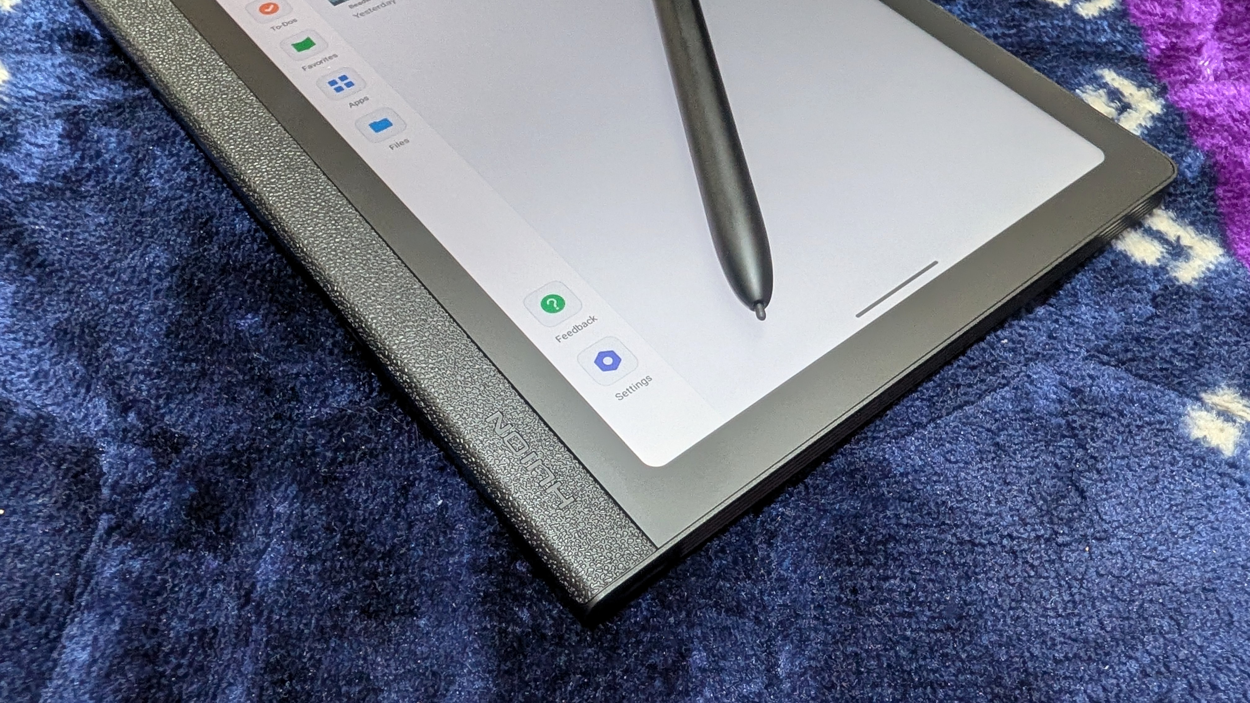 Huion Note E Android tablet with a stylus and paper-like display