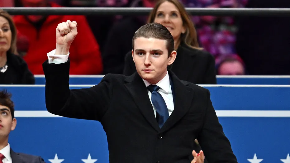 Barron Trump gestures