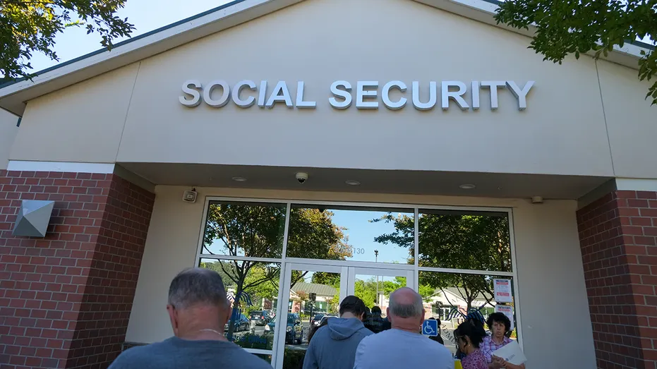 People wait in line for Social Security checks