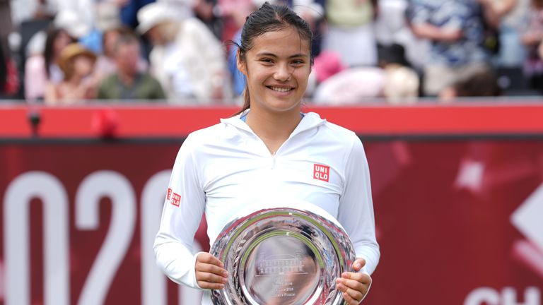 Emma Raducanu of Britain poses with the runners up trophy after losing the women's final of the Queen's Club tennis championships against Do