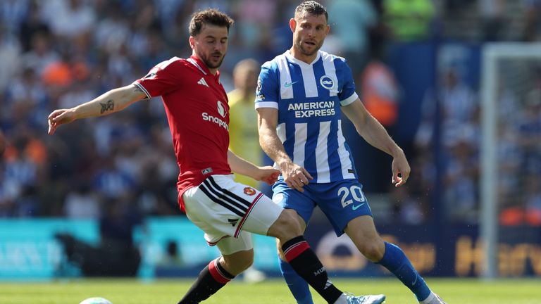 James Milner passes the ball under pressure from Mason Mount