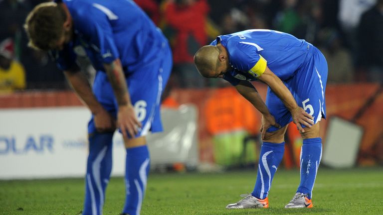 Italy's defender Fabio Cannavaro and Italy's midfielder Daniele De Rossi react during the defeat to Slovakia at the 2010 World Cup