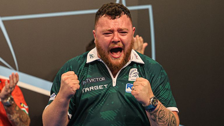 Josh Rock celebrates after winning the World Cup of Darts (Jenny Segers, PDC Europe)