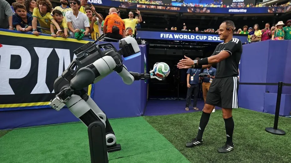 Atlas delivers match ball to referee