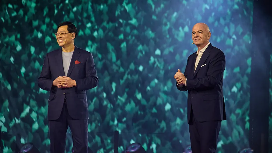 Lenovo CEO Yang Yuanqing and FIFA President Gianni Infantino