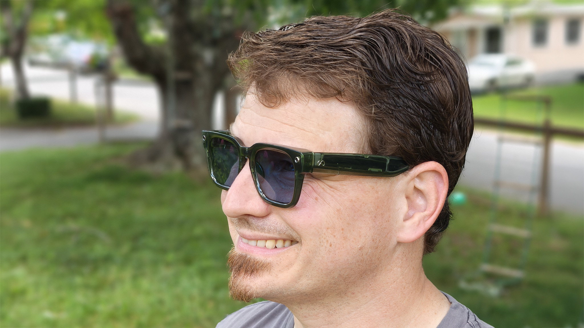 Wearing green Meta Fury smart glasses