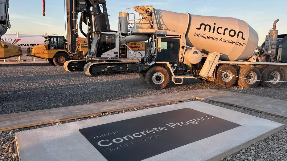 A commemorative plaque marks the milestone concrete pour at Micron’s New York site.