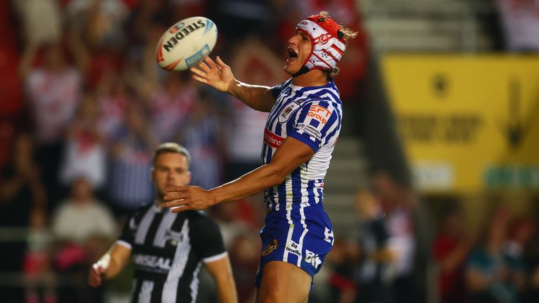 St Helens' Harry Robertson scores the last try for his side