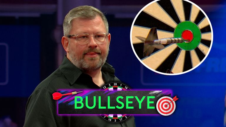James Wade takes out 121 finish on the bullseye for the second time in the match as he looks to narrow the gap as he trails and pressurise Gian van Veen.