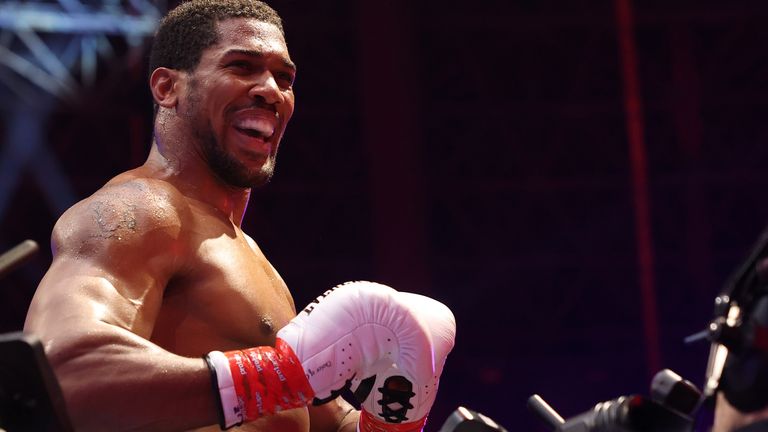 Anthony Joshua celebrates after he knocked out Kristian Prenga in the second round