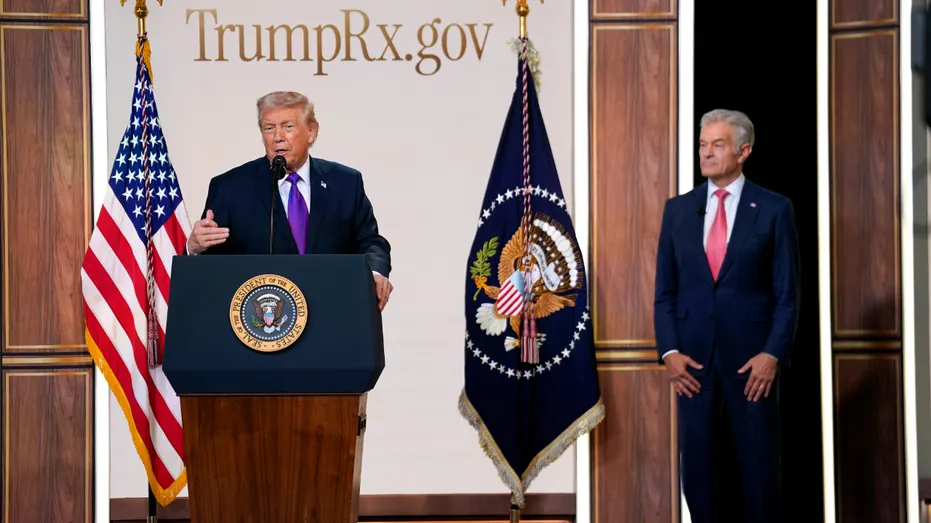 President Donald Trump and Dr. Mehmet Oz at an event.