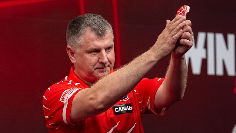 Krzysztof Ratajski celebrates victory in Leverkusen [Sebastian Doppstadt/PDC Europe]