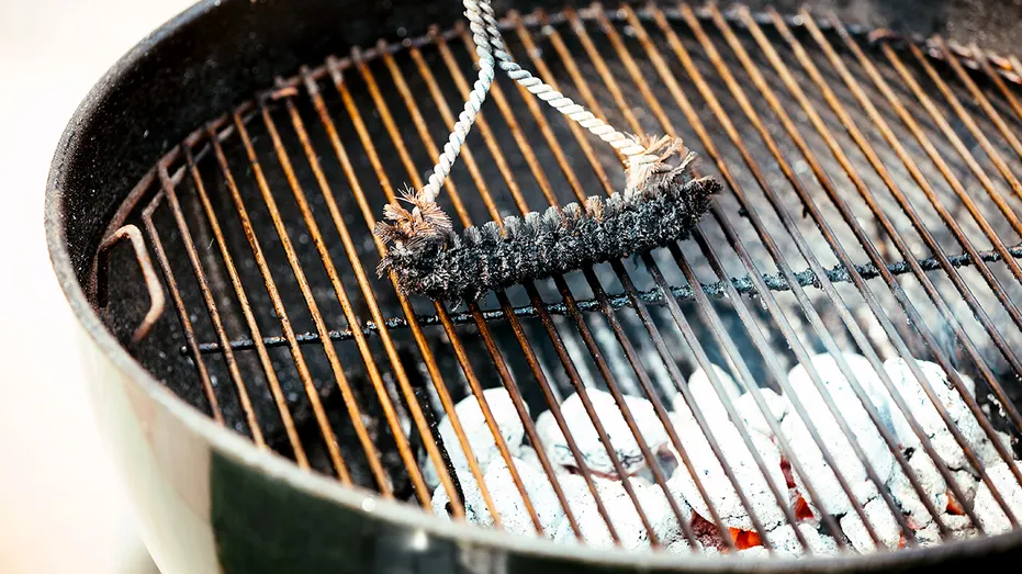 A dirty grill brush.
