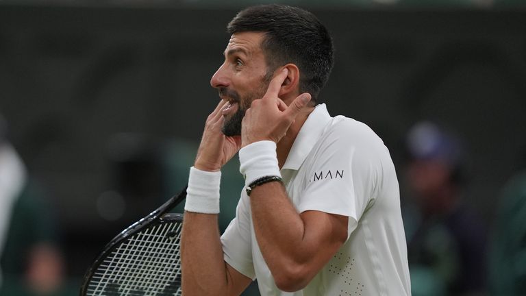 Novak Djokovic of Serbia reacts during his match against Felix Auger-Aliassime of Canada in the quarter-final men's singles competition, at the Wimbledon Tennis Championships in London, Tuesday, July 7, 2026. (AP Photo/Maja Smiejkowska)