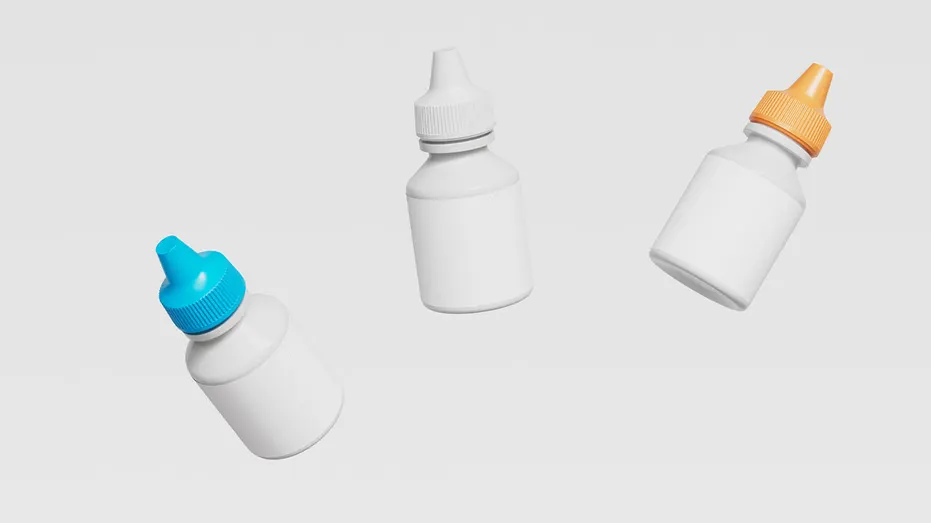 three unlabled eyedrop bottles