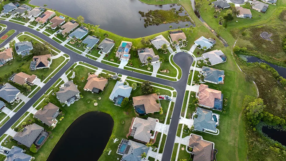 Residential homes in suburban sprawl development in North Port, Florida. Low-density private houses in rural suburbs. Housing market in the USA.