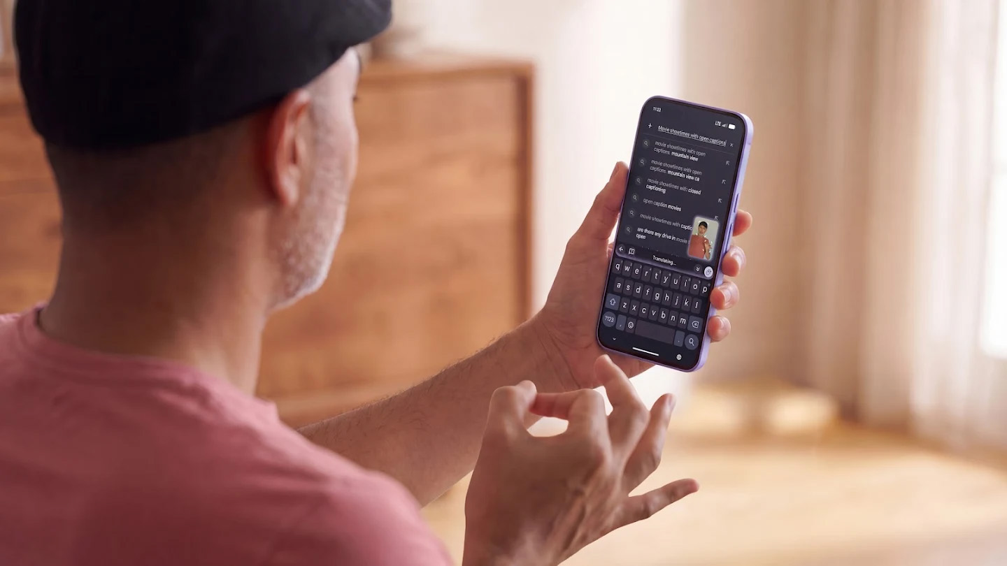 A man using sign language to type into a search box, powered by Gemini's SL2T engine