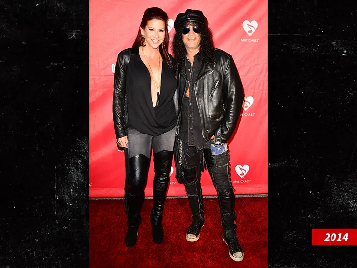 Slash and Perla Ferrar Getty 2
