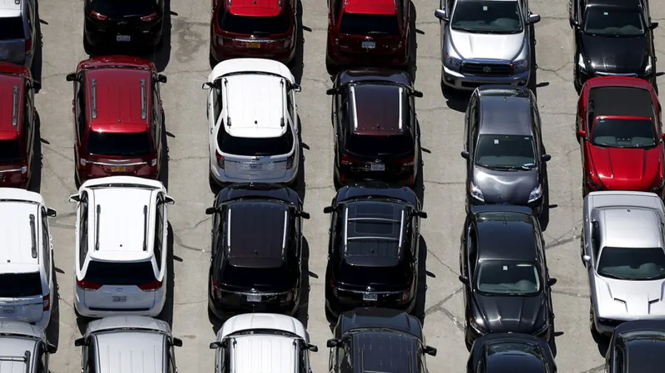 Cars are seen in a parking lot in Palm Springs, California April 13, 2015.