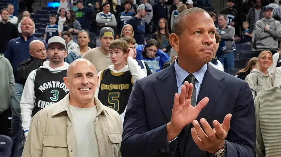 Marc Lore and Alex Rodriguez attend a Timberwolves game in Minnesota