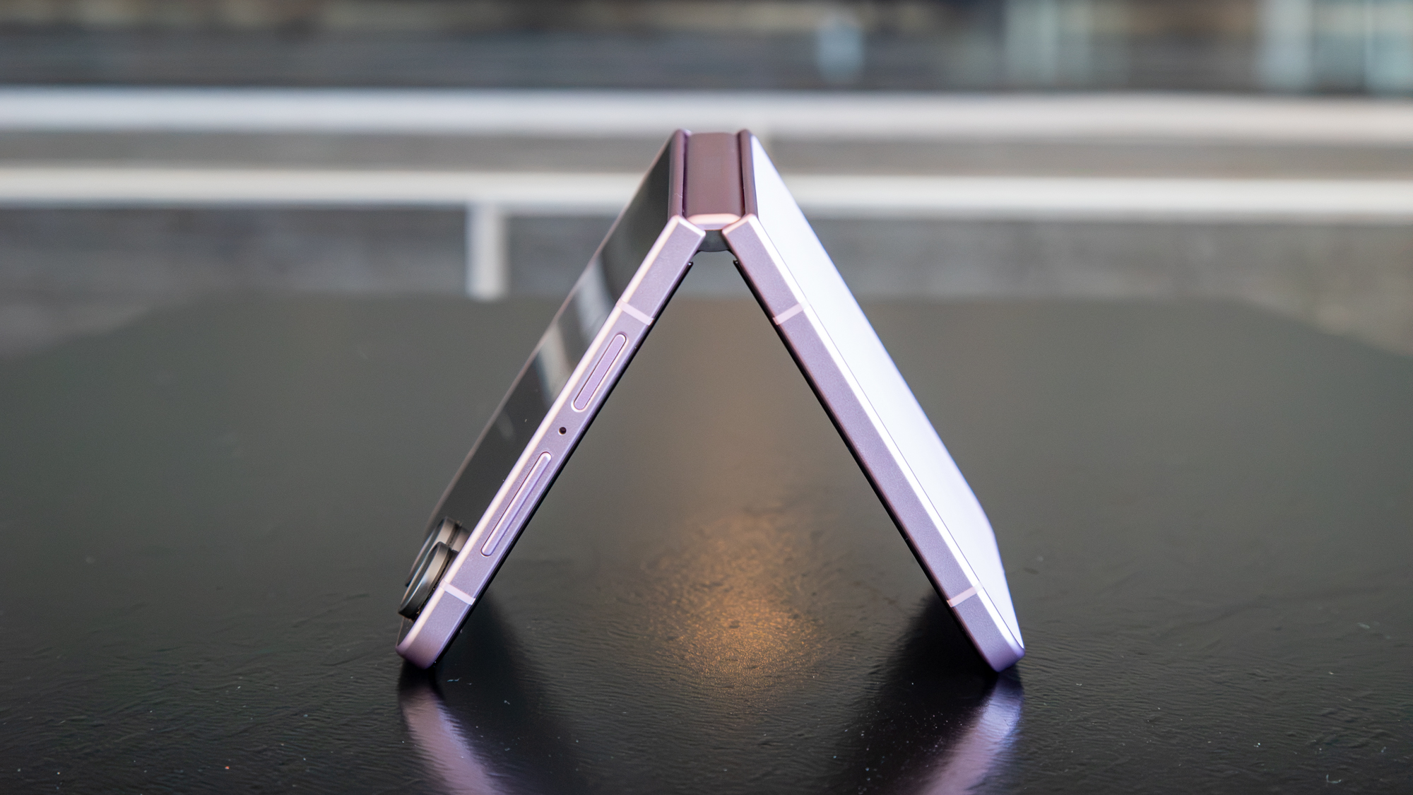 Galaxy Z Flip 8 tended on a black surface