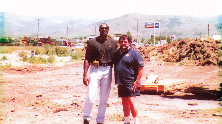 Basketball pro Karl Malone with John Gullo at the opeining of a new Burger King