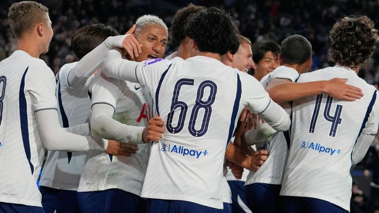 Richarlison is congratulated by his Spurs team-mates