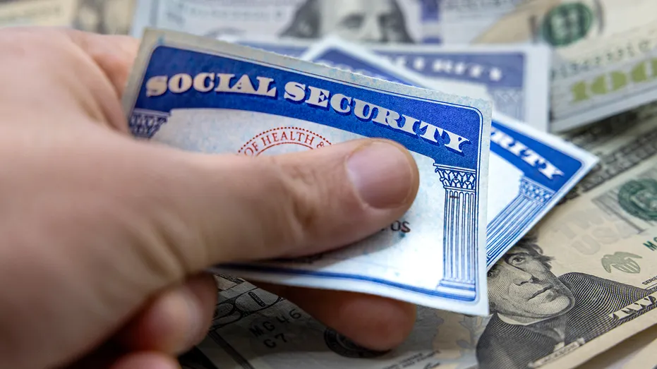 Man holds Social Security card near cash